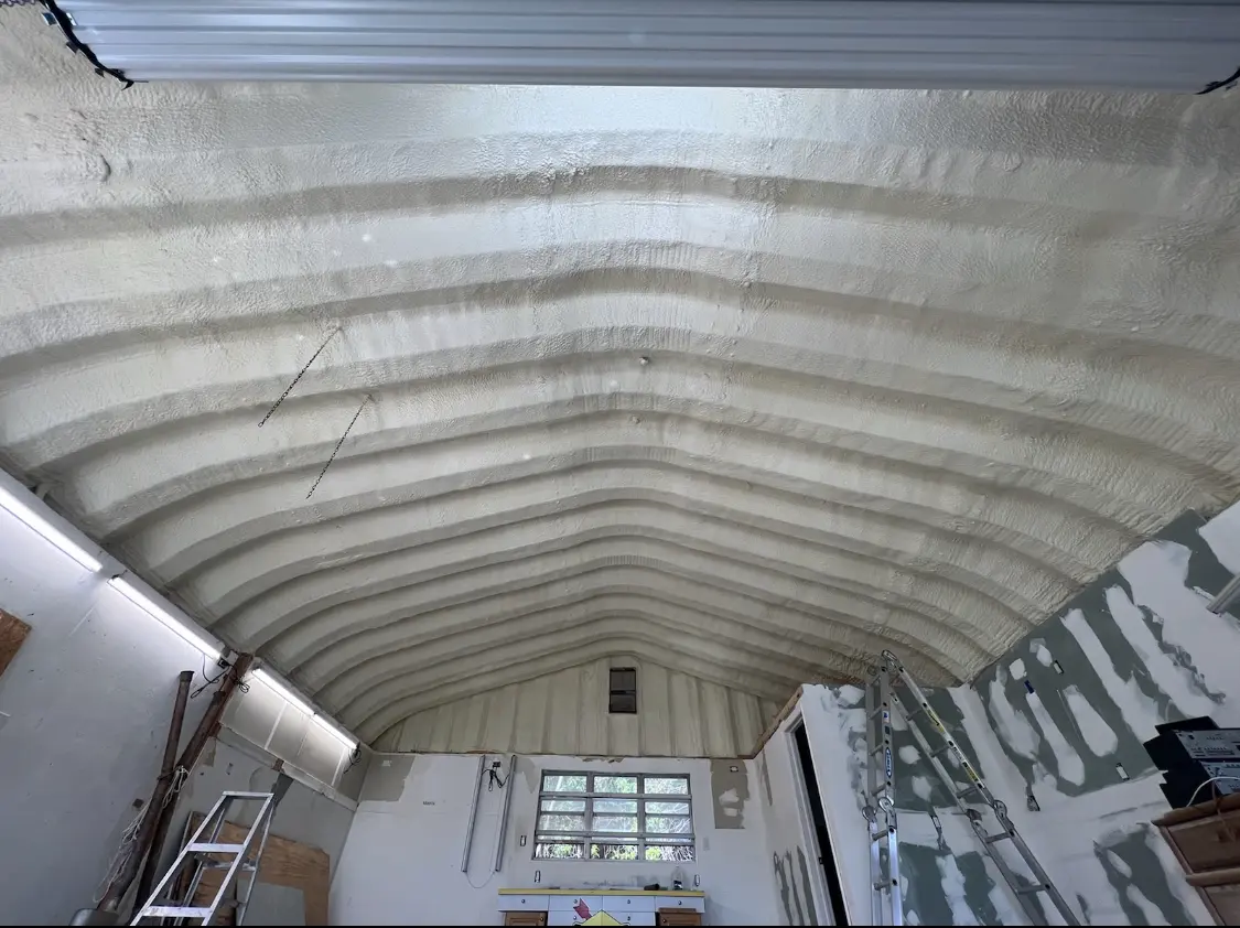 Spray polyurethane foam applied to the underside of a metal roof deck in Berkeley